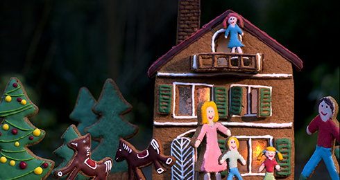 Lebkuchenhaus mit Figuren und Pferden